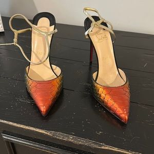Never worn Christian Louboutin snake skin multi color sling backs